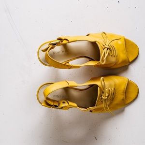 Peep toe lace up slingback heels.